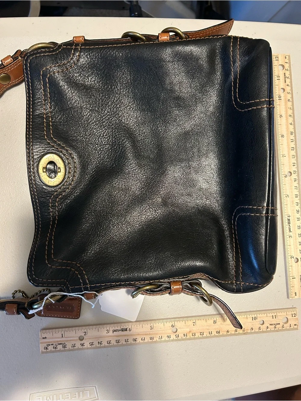 Coach sleek black